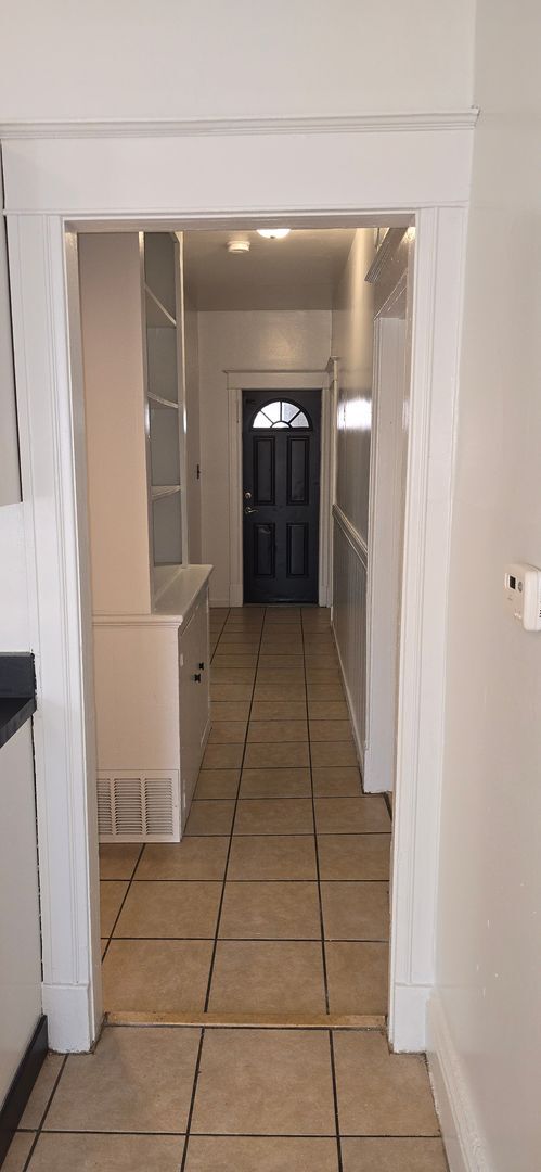 Building Photo - Large remodeled 4 bedroom with off street parking available