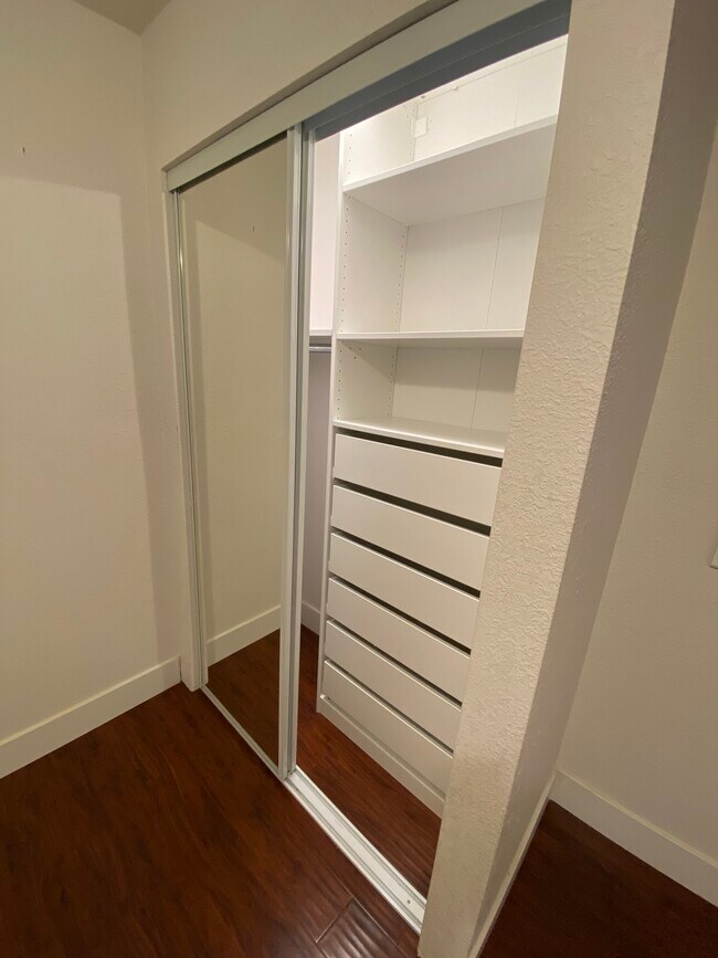 Bedroom 2 closet with built ins - 8561 Cedar Dr