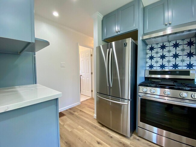Building Photo - Remodeled 3BR, 2BA with Orchard, Garage & ...