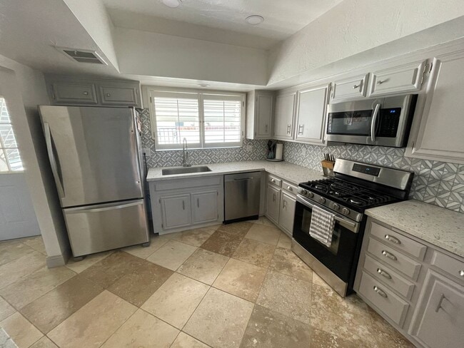 Building Photo - COMING SOON, Fully Furnished Desert Gem!