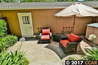 private patio that leads to 2 car garage - 133 Lawnview Cir