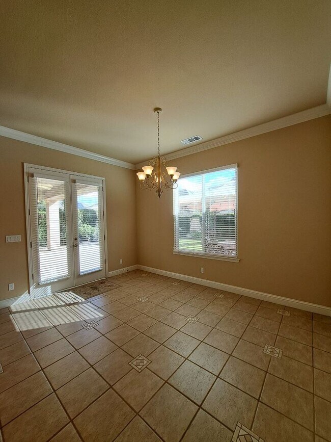 Building Photo - Custom Clovis Residence in Gated Community | Spacious Layout & 3-Car Garage!