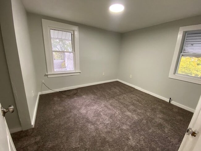 Building Photo - Updated 5-Bed, 2-Bath with Attic Suite & Clean Basement