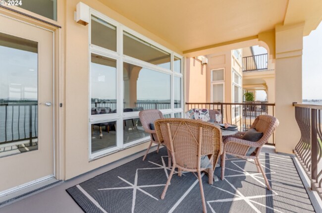 Building Photo - Elegant Riverfront Condo with Panoramic Vi...