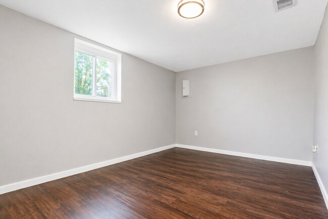 Building Photo - This charming 5-bedroom, 2-bathroom home is available for $2,000/month.