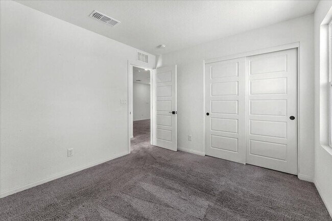 Building Photo - Gorgeous Five Bedroom in the SW! Solar panels!