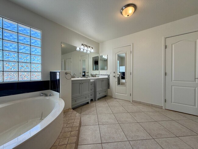 Building Photo - Spacious Henderson Home with Private Pool, 3 Fireplaces, & Modern Upgrades