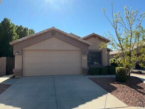 Building Photo - 10657 E Enid Ave