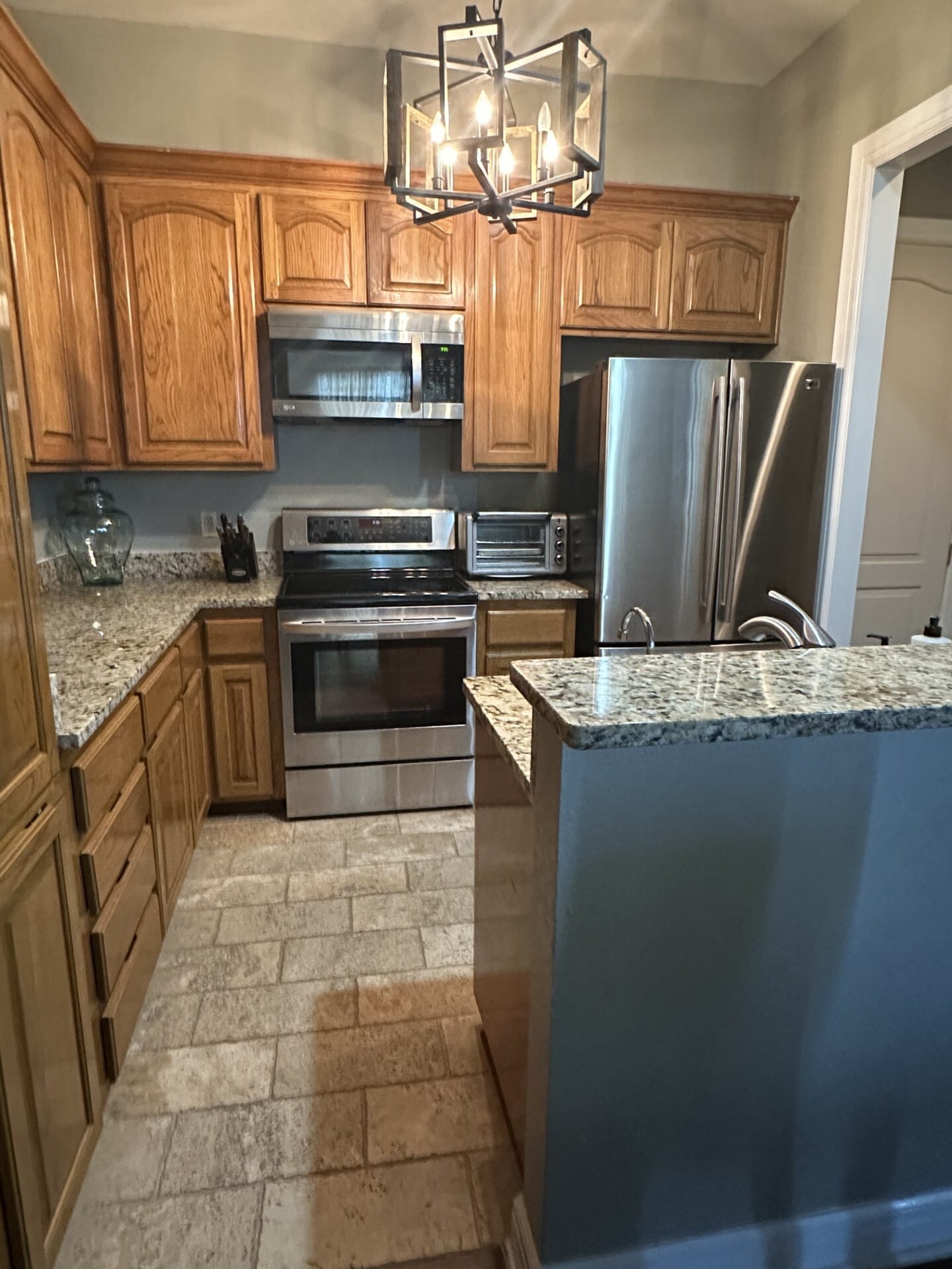 Kitchen has stone flooring and granite counters - 38400 Interstate 10 W