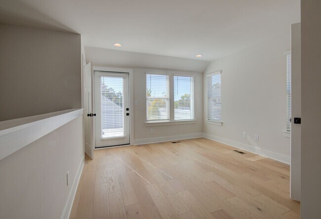 Building Photo - COMING SOON! Modern End-Unit Living Near Uptown | Rooftop Terrace + Tandem Garage