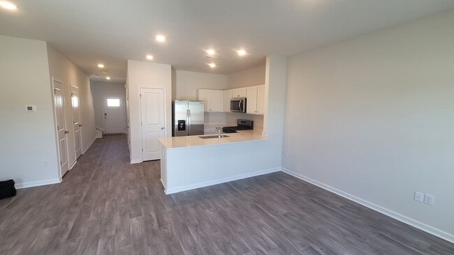 Building Photo - Beautiful New Townhome for Military Tenant