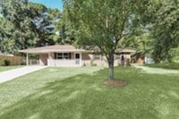 Building Photo - Pet Friendly - Fully Fenced in Yard with Two Storage Buildings