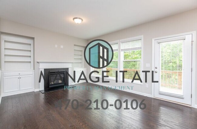 Building Photo - End unit! Gorgeous townhouse in the Suwane...