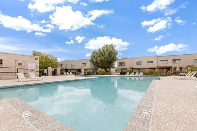 Building Photo - Discover this charming two-story townhome