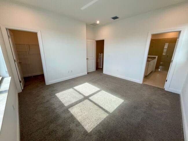 Building Photo - 3/2.5/2 Townhome in Rosette Park at Newfield