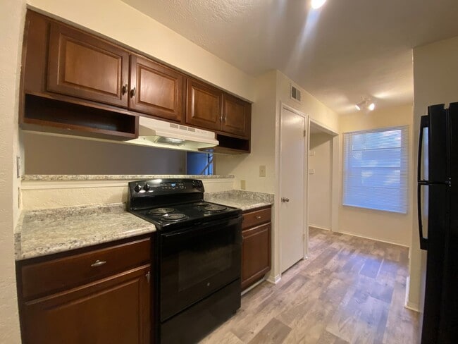 Building Photo - Charming 2 Bedroom, 2.5 Bath Condo, Move-In Ready! Step into this beautifully maintained condo fe...