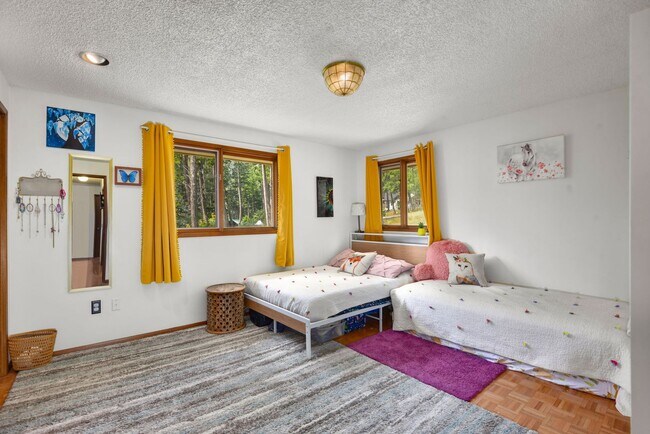 Building Photo - 2700 + sq ft family home has it all! Over 2 acres of land and a stunning view of Lake Pend Oreille