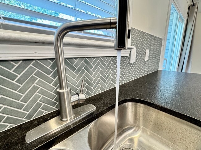 Building Photo - Completely Renovated & Ready 02-25-26! 2 Primary Suites, All Appliances Convey and Dog-Friendly!