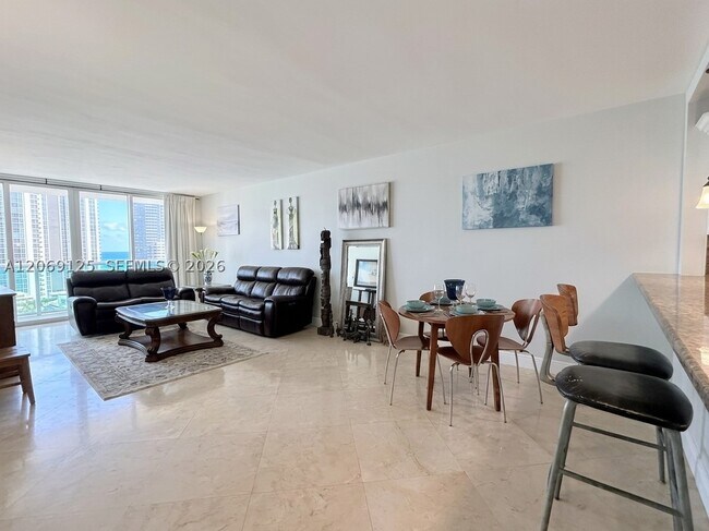 Building Photo - 19370 Collins Ave