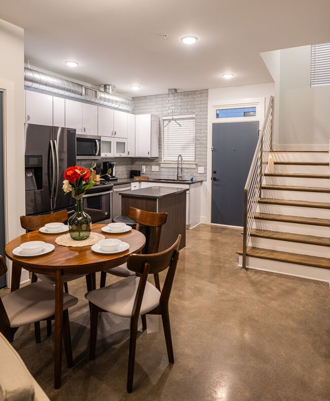 Building Photo - Brand new townhome offers the perfect blen...