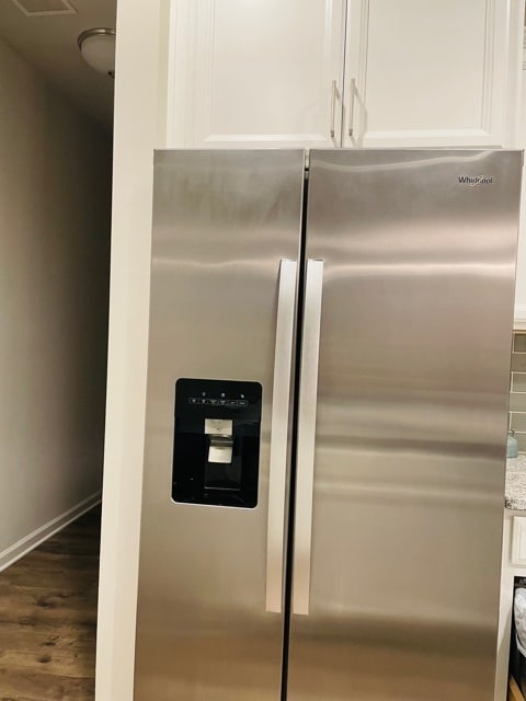 Stainless steel side by side refrigerator and freezer includes an ice maker and filtered water - 6126 Centennial Run