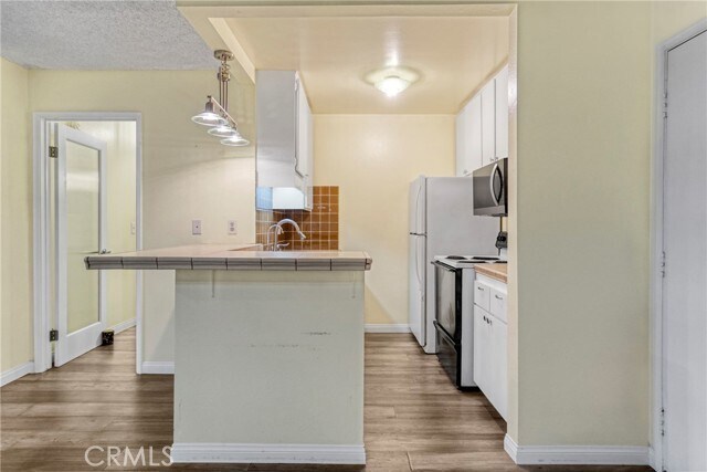 Building Photo - 8650 Gulana Ave