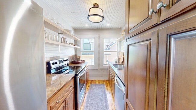 Building Photo - Presenting a meticulously renovated and fu...