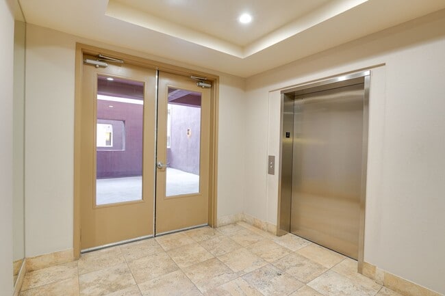 Building Photo - Luxury Guard-Gated 2-Bedroom Condo with Private Garage & Resort Amenities!