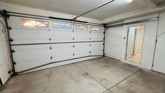 Very large 2-car garage with tons o storage and bike hooks - 2107 Plant Ave