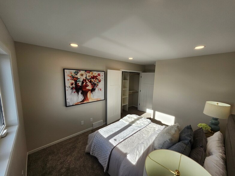 Bedroom two with closet open - 5310 Welder Ave