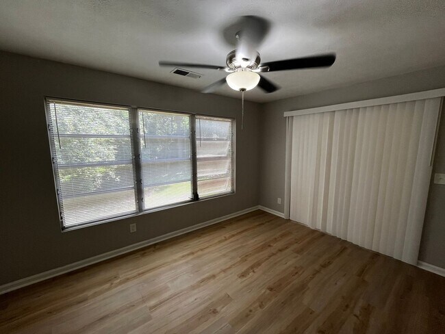 Building Photo - Must See the Sunroom off the Primary Bedroom!