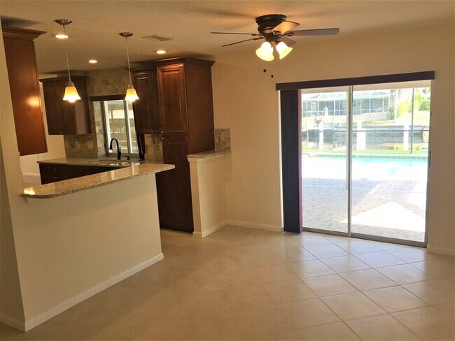 Building Photo - Cape Coral Gulf Access Pool Home