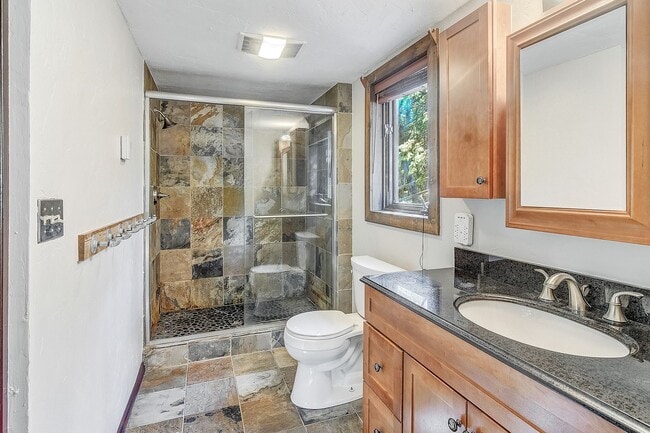 Building Photo - Cabin in the woods!  Fenced Yard!  Year le...
