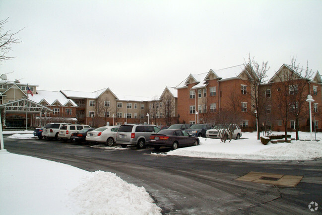 Building Photo - Town Village Sterling Heights