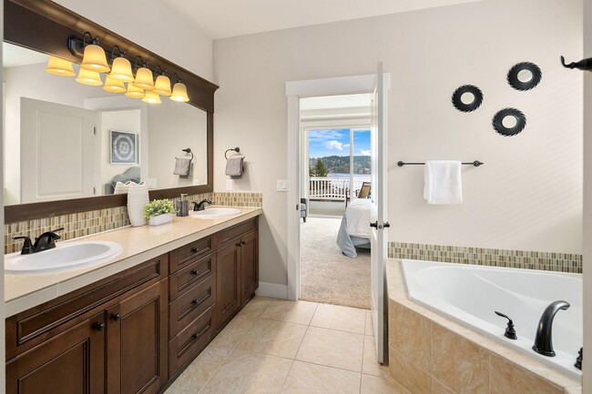 Building Photo - Water Views| Expansive Deck | Flexible Living Spaces