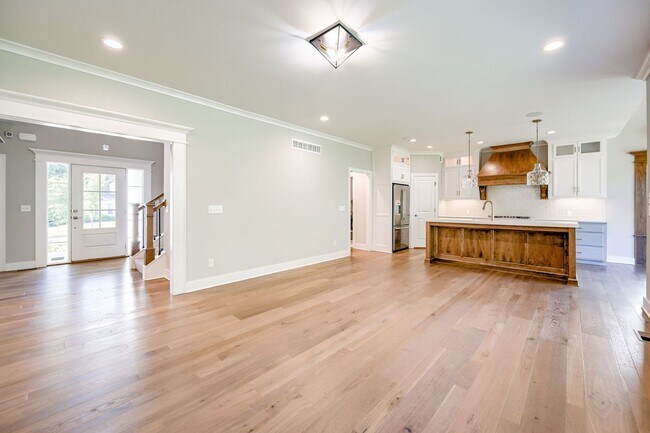 Building Photo - {4620} James Engle Custom Home built in 2019 + Main Floor Primary Bedroom + Finished Basement wit...