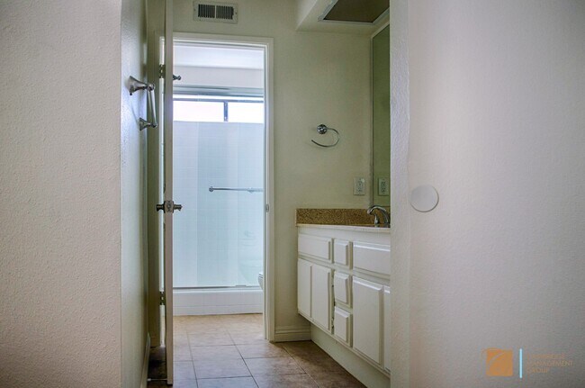 Building Photo - Enjoy Carlsbad living in this beautifully ...