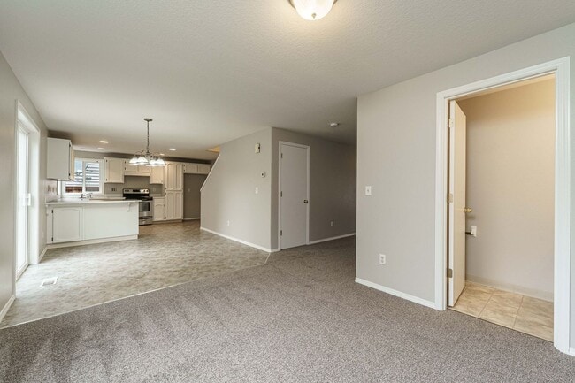 Building Photo - A/C Equipped 4 Bedroom 2.5 Bath Located in...