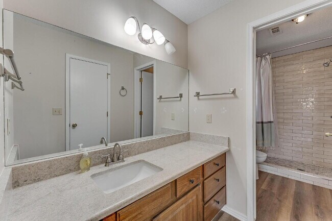 Building Photo - East Fayetteville 3-Bedroom Home with Granite Touches & Cozy Fireplace!"