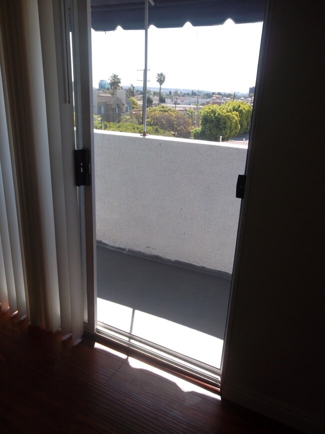 Balcony with view of city - 1427 Saltair S Ave