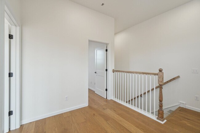 Building Photo - Classic Cape Cod Meets Modern Glam: Your D...