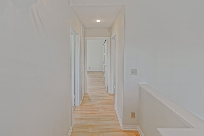 Building Photo - PRIME POOLFRONT LOCATION & CLOSE TO MAIN GATE! BRIGHT & SPACIOUS, END-UNIT POOLFRONT TOWNHOUSE W/...