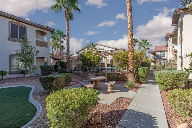 Building Photo - 1st floor unit with garage in gated Hender...