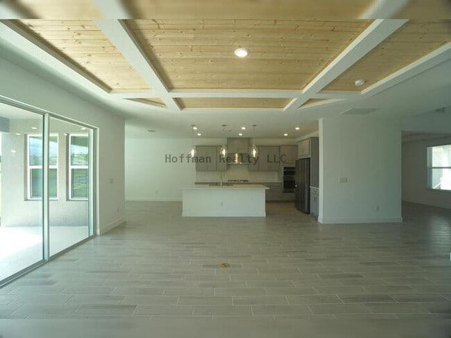 Building Photo - Stunning 5-Bedroom Lakeview Home in River Landing, Wesley Chapel