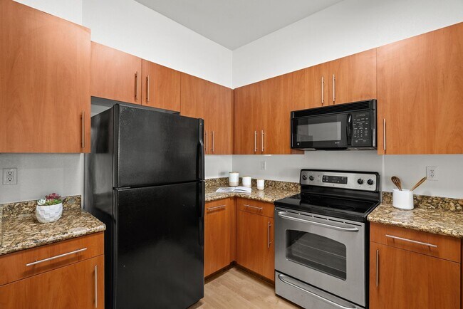 Building Photo - Modern and Luxurious 1 Bedroom 1 Bath Condo in the Desirable Brickyard Community
