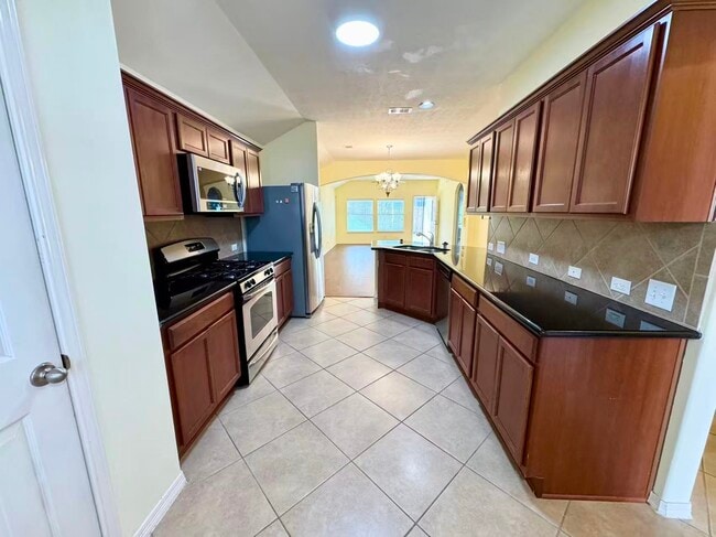 Building Photo - 6418 Black Bamboo Ln