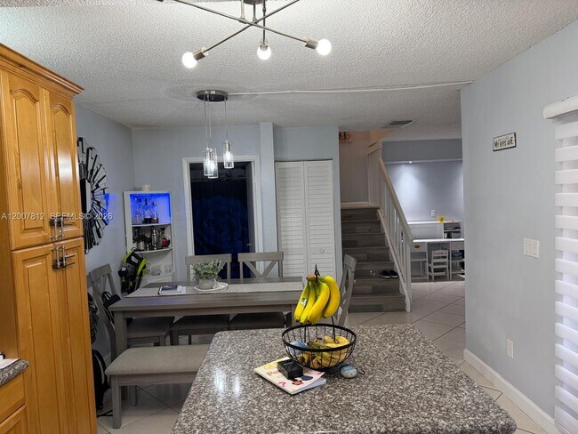 Building Photo - 6580 W 24th Ct