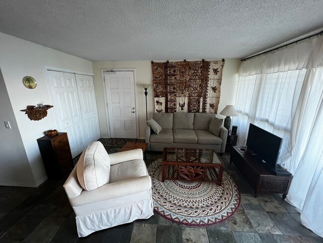 Building Photo - Furnished 2 bedroom 2 bath condo with assigned parking stalls