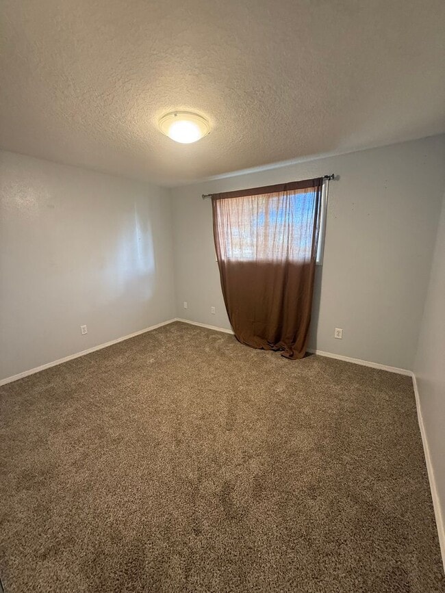 Building Photo - Updated 3+ Bedroom 2 Bath House with Large Fenced In Yard