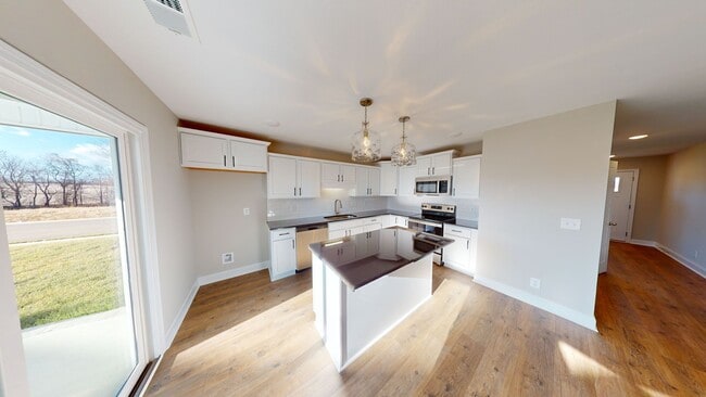 Building Photo - Modern Home with Open Layout, Fireplace and Farmland Views